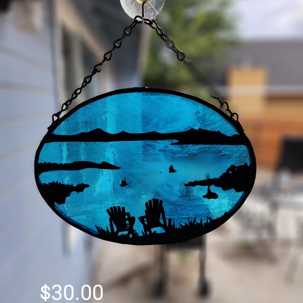Blue Stained Glass Art with Scenic Design